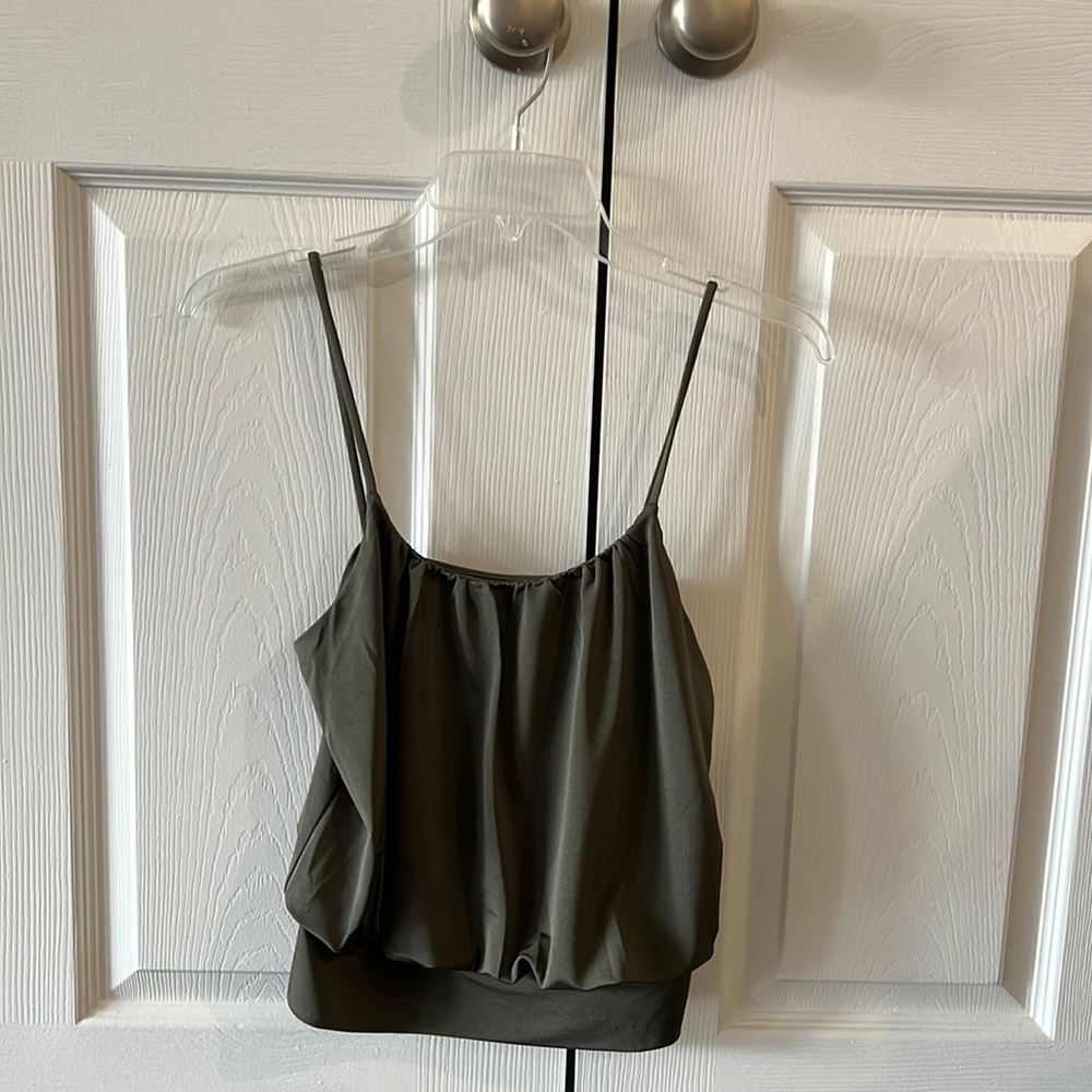 Brand New spaghetti strap banded waist top.